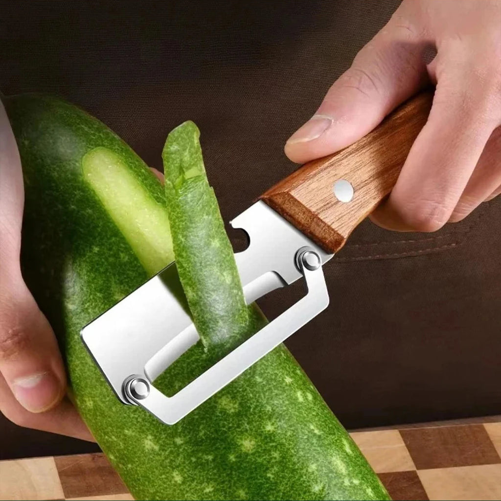 Stainless steel peeler slicing fruits and vegetables